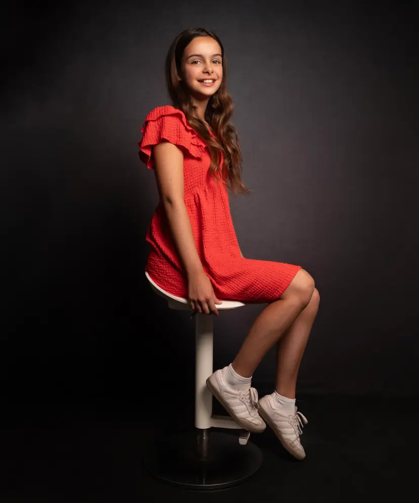 model on stool